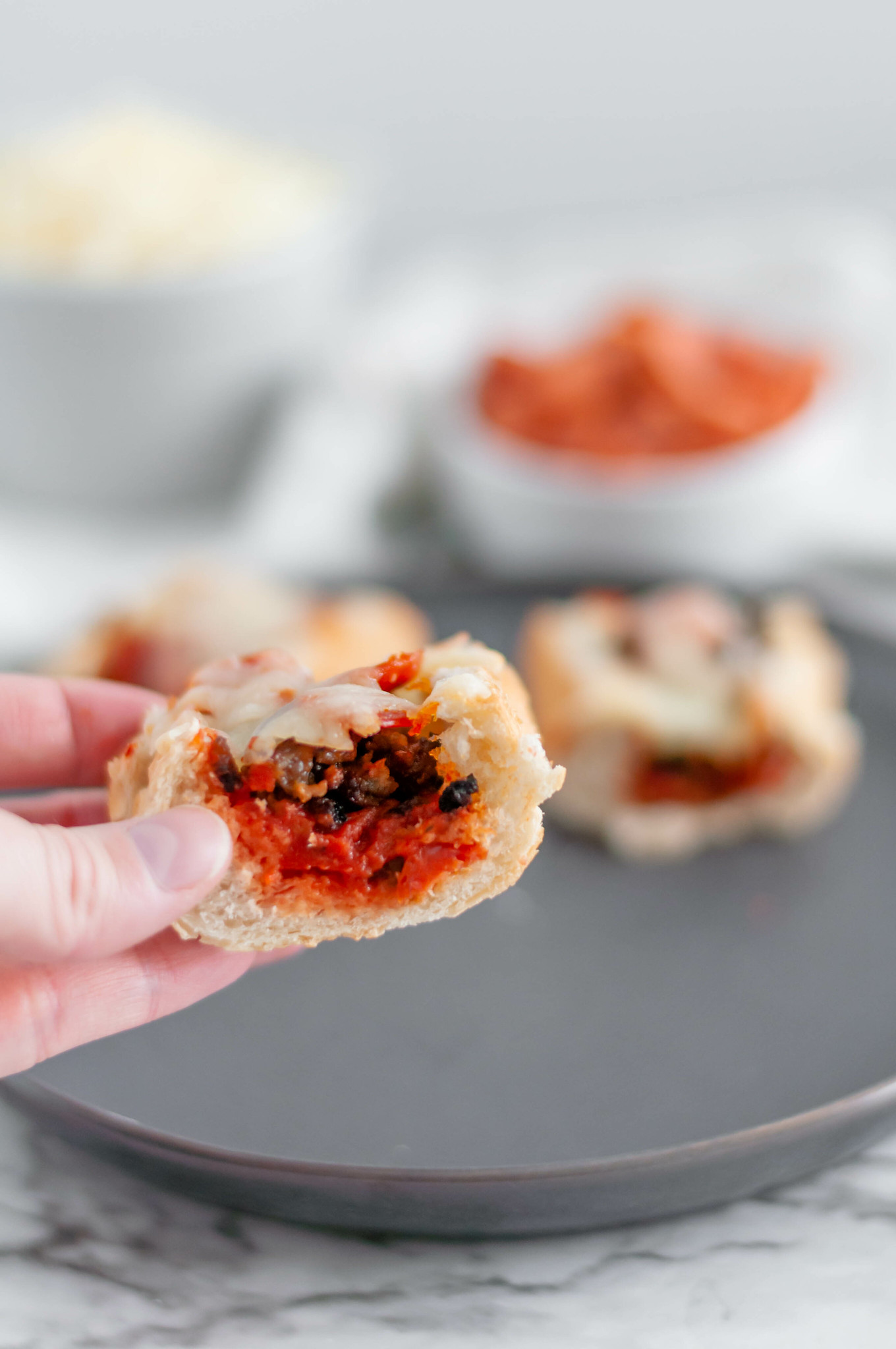 These French Bread Pizza Bites are a great option for the Super Bowl this year. French baguette is hollowed out & stuffed with your favorite pizza toppings.