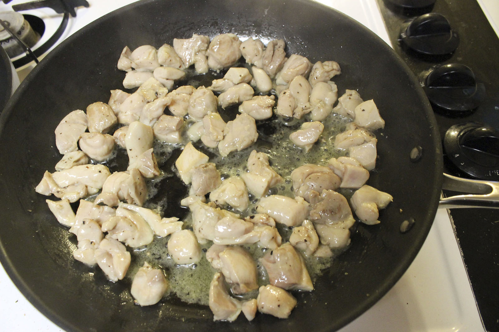 Chicken thighs cooking