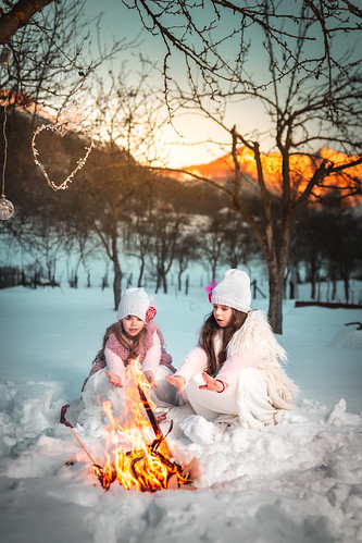 child fire winter sunset fairy tales