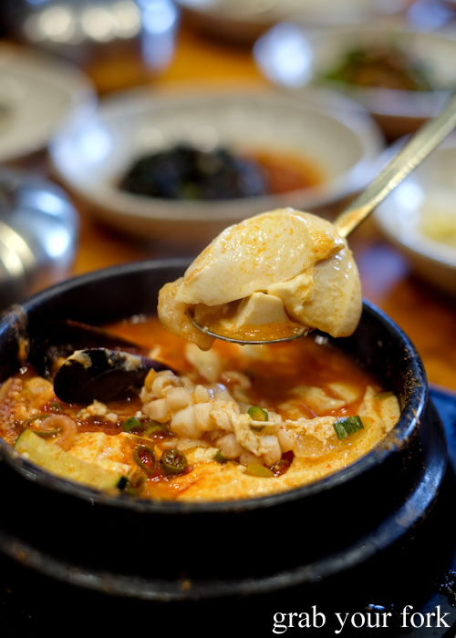 Spicy soft tofu stew with seafood at Myeong Dong Korean Restaurant in North Strathfield