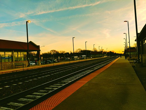 commute commuting train trainstation depot tracks traintracks morning sky sunrise waiting metra suburbs