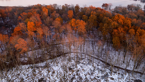 dji djiphantom4advanced kalamazoocounty michigan portage us unitedstates westlakenaturepreserve aerialphotography drone flying goldenhour nature outdoor park snow sunset trail