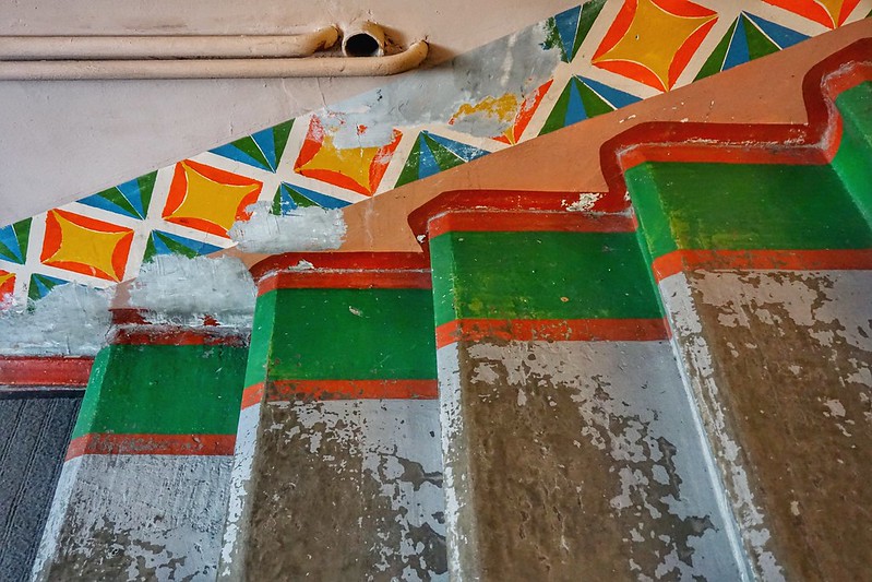 Brightly painted patterned stairs in the Pyramiden hotel
