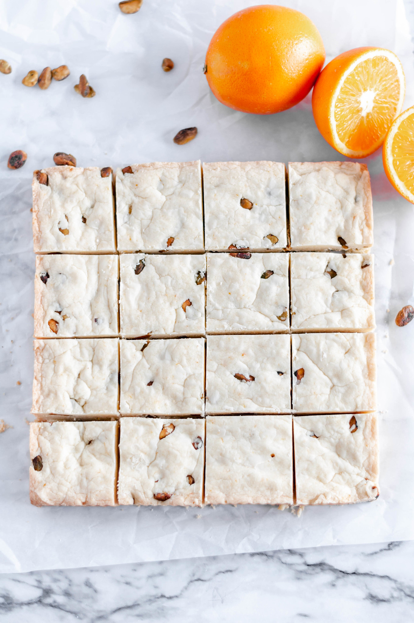 Orange Pistachio Shortbread Bars are a delicious, festive and simple cookie bar that you need to make this Christmas. Melt in your mouth delicious and oh so buttery.