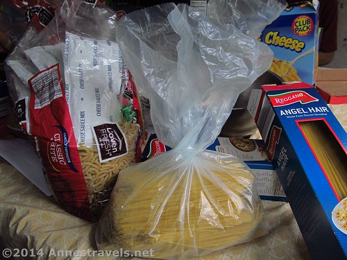 Taking all the noodles out of their boxes and placing them in bags saves tons of space in the van.