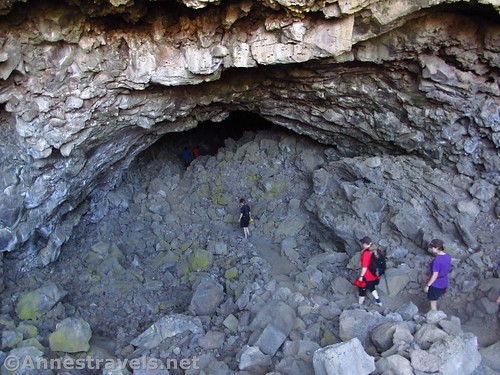 Walking into Indian Well Cave in Lava Beds National Monument, California