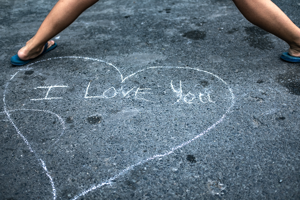 I LOVE YOU in chalk on ground--Saigon