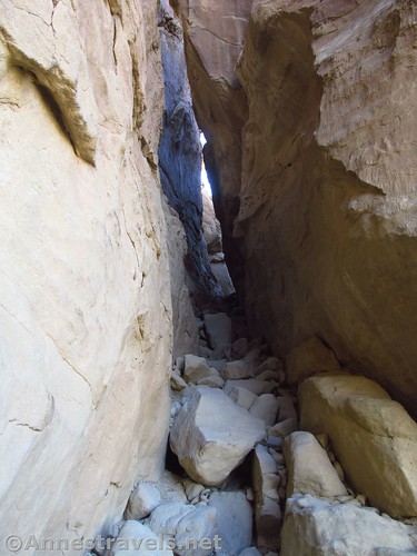 Walking up the slot canyon to the mesa on the Pueblo Alto Loop in Chaco Culture National Historical Park, New Mexico