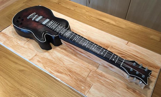 Cherub Pie, this guitar cake is as long as my kitchen table. By Gemma Houchen