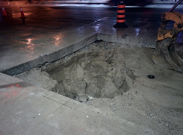 Underneath the pavement, Dufferin Street #toronto #dufferinstreet #night #pavement #dirt #construction #latergram