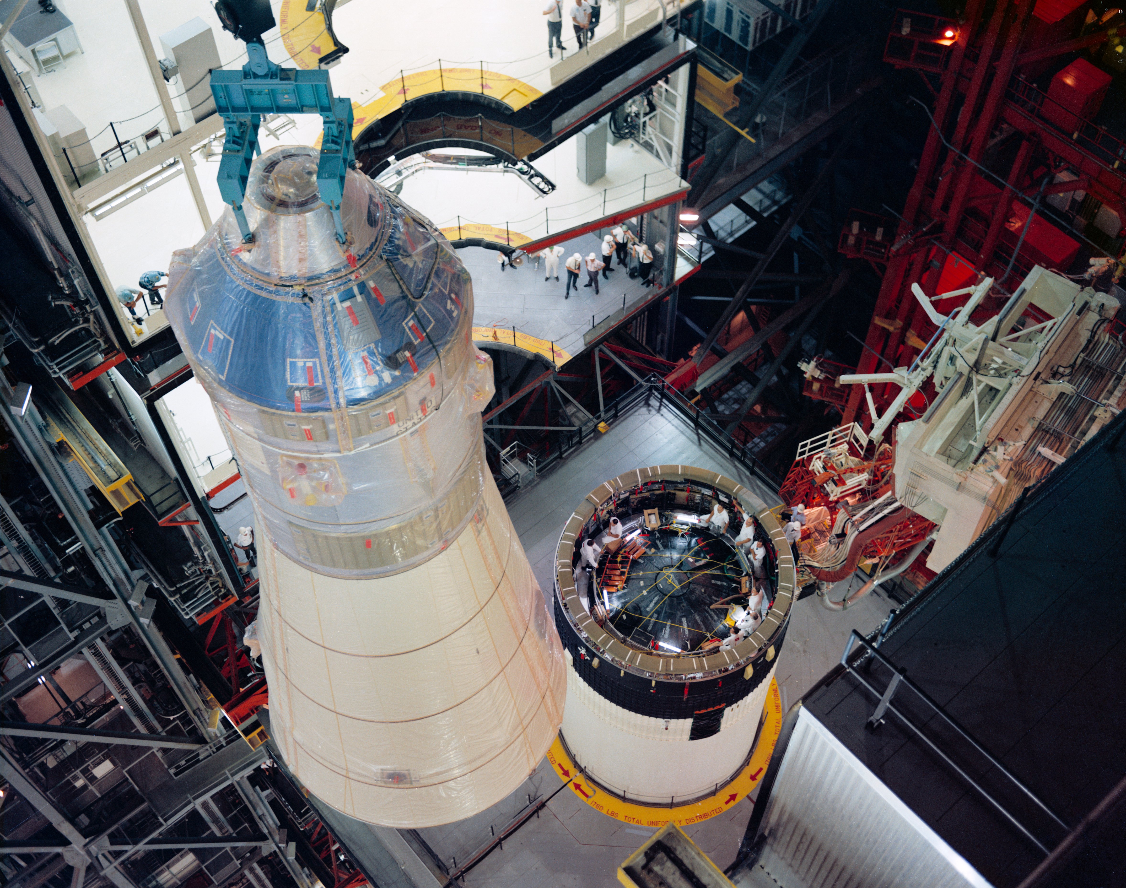 Erection and mating of spacecraft 103 to Launch Vehicle AS-503 in the VAB for the Apollo 8 mission. Photo taken in October 1968. NASA Image ID: S68-49478