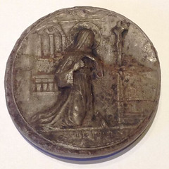 Wax Agnus Dei depicting Saint Rita