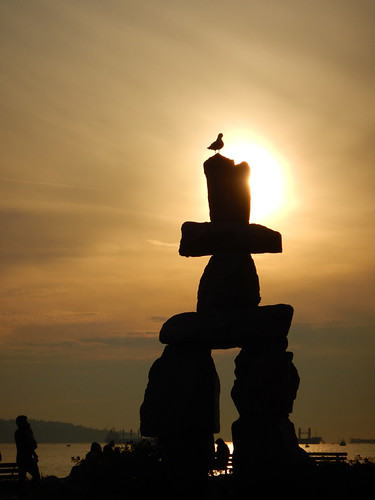 The Inukshuk in front of a smoky sunset in August and September when our province was on fire (Vancouver, Canada)