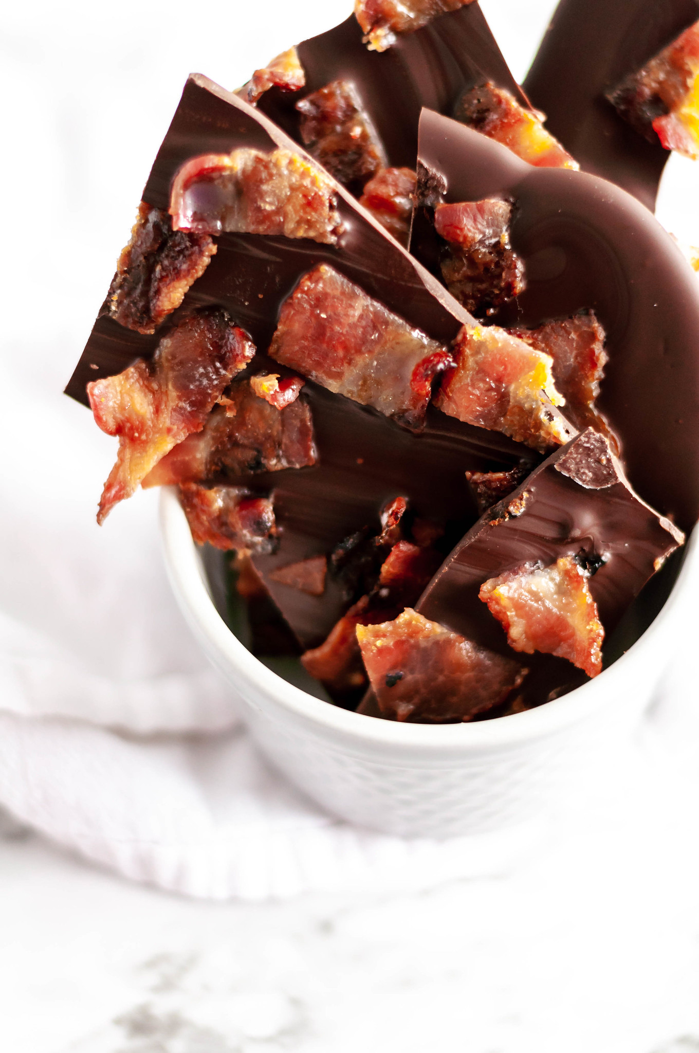 Candied Bacon Bark is a super simple, 4-ingredient treat that is perfect for the bacon lover in your life this Christmas. A fun, different addition to your Christmas baking list this year.