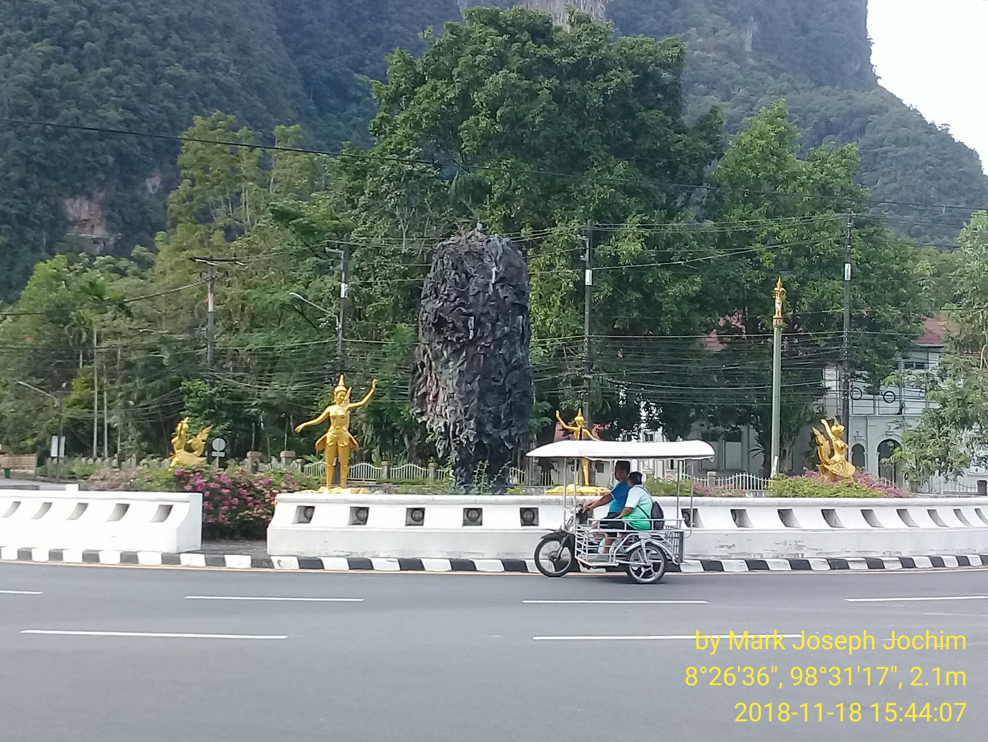 A replica of Ko Ta Pu (James Bond Island) sits in a traffic circle at the center of Phang Nga Town, Thailand. Photo taken by Mark Joseph Jochim on November 18, 2018.