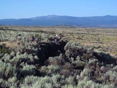 Walking along the rim of the Big Crack, Lava Beds National Monument, California
