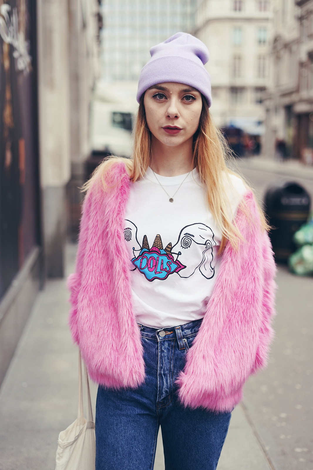 A band tee and a faux fur coat