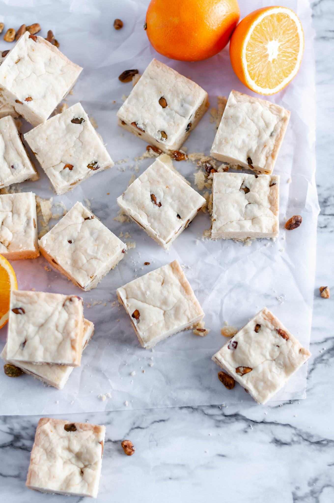 Orange Pistachio Shortbread Bars are a delicious, festive and simple cookie bar that you need to make this Christmas. Melt in your mouth delicious and oh so buttery.
