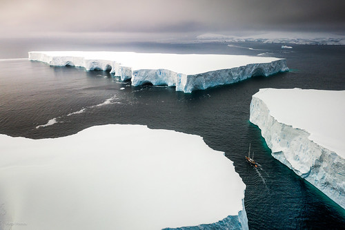 antarctic boat sailing icebers