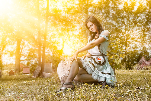 portrait model woman dress fantasy outdoor trees grass strobist
