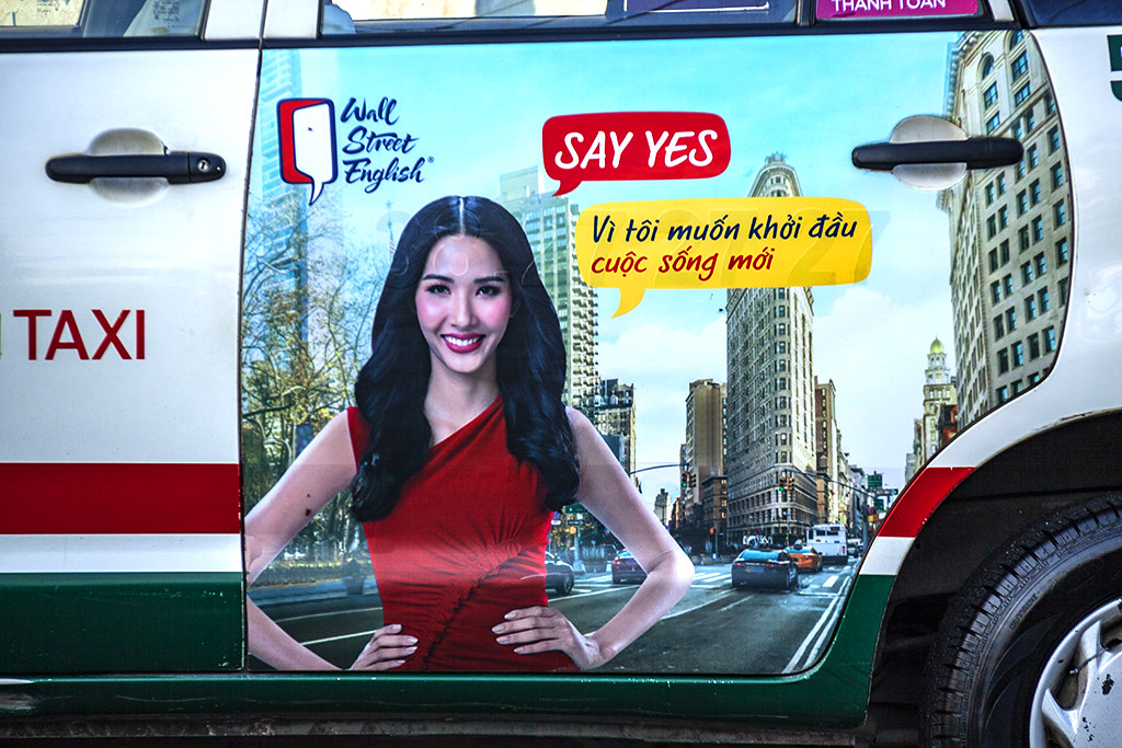 Wall Street English ad on a taxi--Saigon