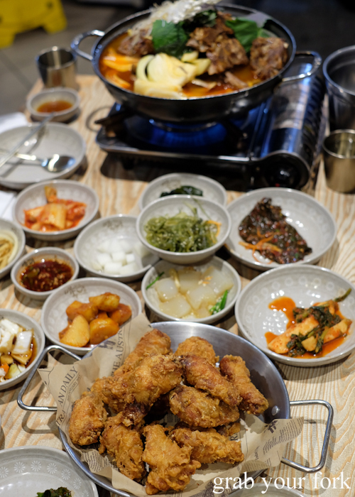 Korean fried chicken, banchan and gamjatang spicy pork rib with potato hot pot at Myeong Dong Korean Restaurant in North Strathfield