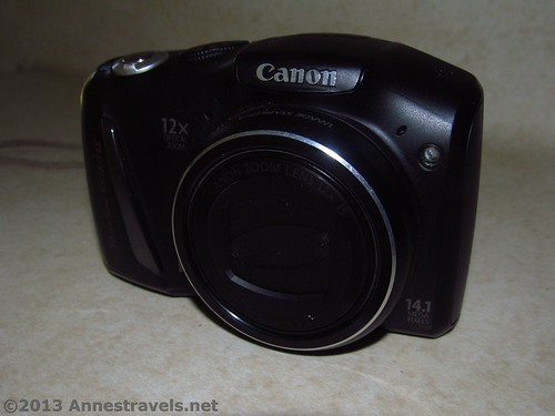 Front view of the Canon PowerShot SX150 IS with the flash closed