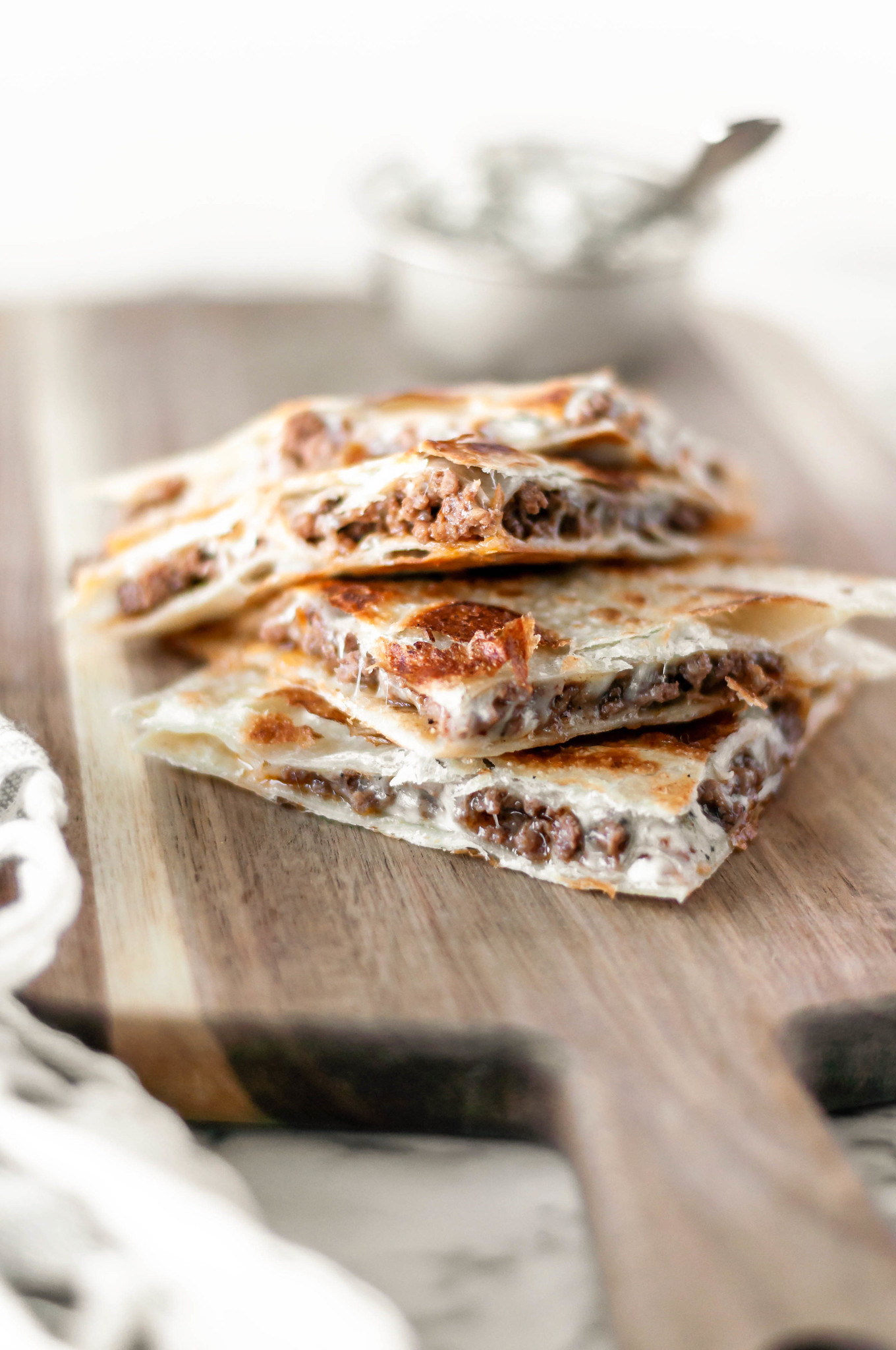 Black and Blue Quesadillas are packed with steak sauce drenched ground beef, blue cheese crumbles and stringy mozzarella. The perfect 30 minute meal for busy weeknights.