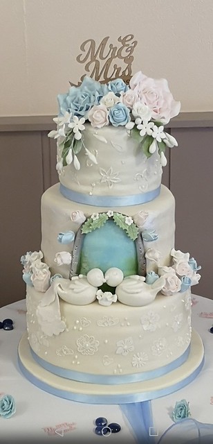 Love Birds Wedding Cake with Handmade Flowers by Rina Lloyd from Rina's Cakes And Bakes