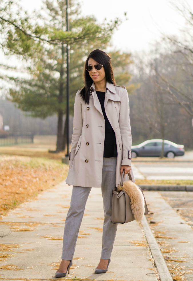 trench coat, black peplum top, gray ankle pants, gray suede pumps, faux fur scarf, taupe bag