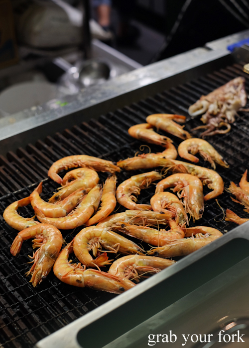 Prawns and squid on the grill at Talay's Thai all you can eat seafood buffet at Duo Central Park in Chippendale