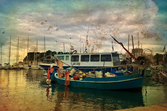 The blue fishing boat...