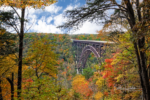 newrivergorgebridge west virginia bridge color fall foliage mountains sky fayetteville